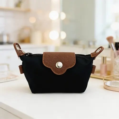 محفظة صغيرة للعملات المعدنية على شكل زلابية - أسود