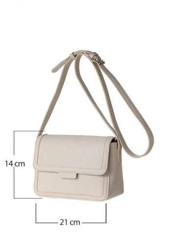 حقيبة كروس بودي بغطاء علوي قلاب - مشمش - مقاس 14*2...