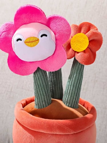 دمية محشوة على شكل زهرة عباد الشمس بشخصية البطريق...