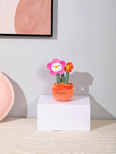 دمية محشوة على شكل زهرة عباد الشمس بشخصية البطريق...