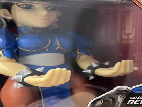 حامل كنترولر بشخصية ستريت فايتر (chun lee )