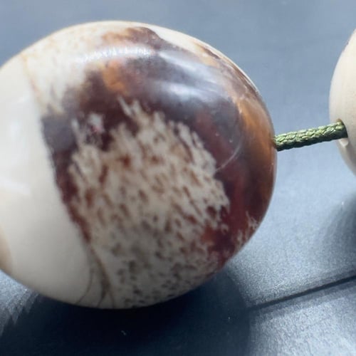 سبحة كهرمان سومطري ملطخ قص بيضاوي