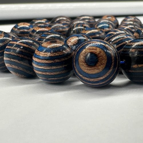 سبحة عيون من خشب الكافور