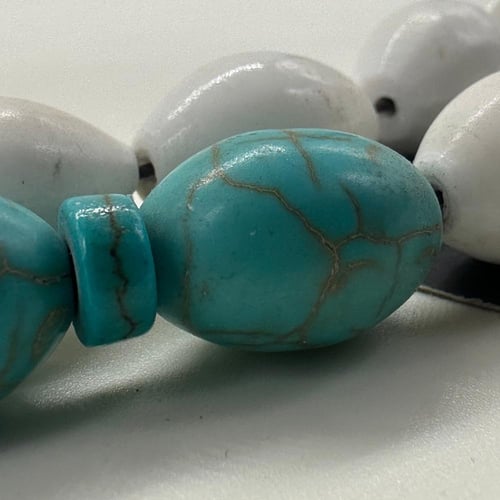 سبحة عظم جمل مطعم بفيروز صناعي