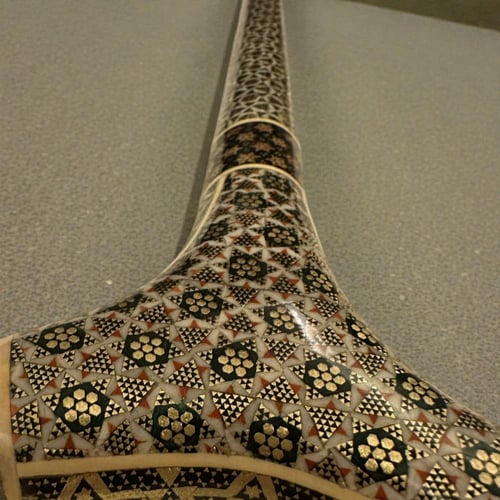 عصى مطعم بالعاج والنحاس