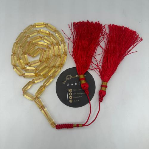 سبحة كهرمان بلطيقي شفاف قص صنوبري