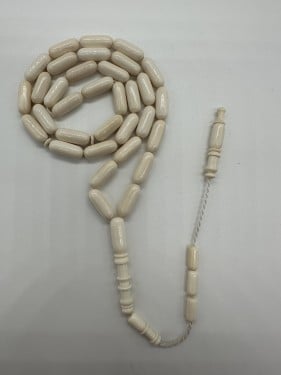 سبحة عاج افريقي قص صنوبري عدد الخرز 33