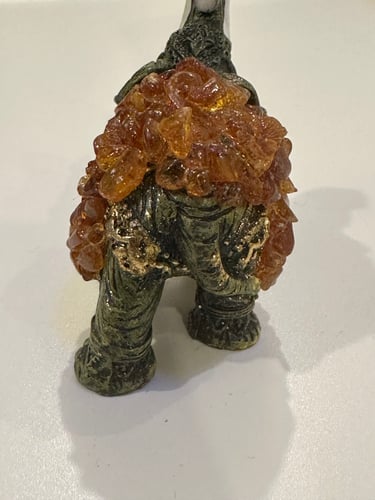 تحفه فيل ملبس كهرمان حر