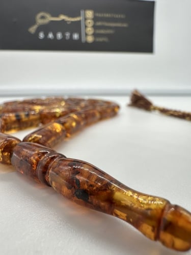 سبحة كهرمان عطش روسي 33 خرزه