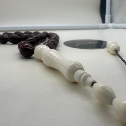 سبحة كوك مطعم بعظم جمل 33 خرزه