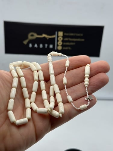 سبحة عاج ناب الفيل قص صنوبري