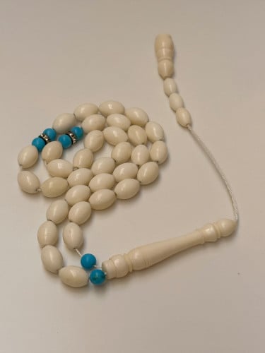 سبحة عظم مطعم بتراب الفيروز عدد الخرز 33