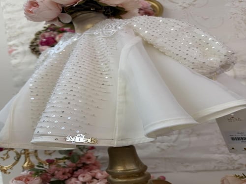 فستان للمواليد مزين بالترتر