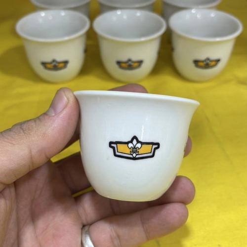 فنجال قهوة بشعار كابرس