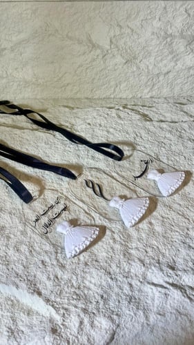 تعلقية فواحه العدد1 شنط الدبش شامل الاسم او العبار...