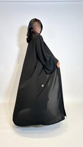 عباية سوداء سادة . 1143