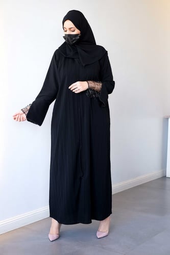 عباية عصرية مزينة بدانتيل وكم مزين بكتل القيطان ال...