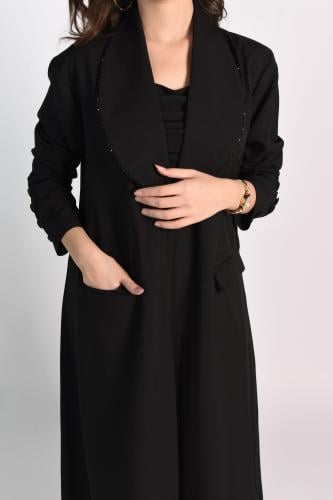 عباية سوداء أنيقة مع جيوب عملية وتصميم خالٍ من الط...