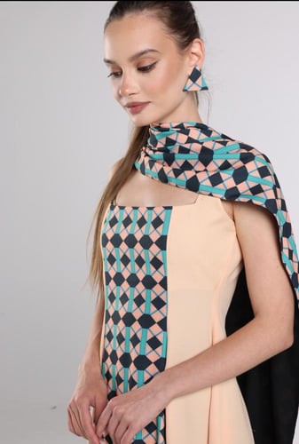 The flowy peach arci dress