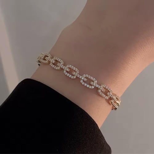 اسوارة ذهبي مرصعة بالزركون