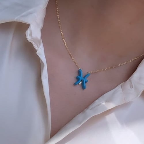 طقم أنيق مكون من قطعتين باللون الذهبي-الفيروزي (SE...