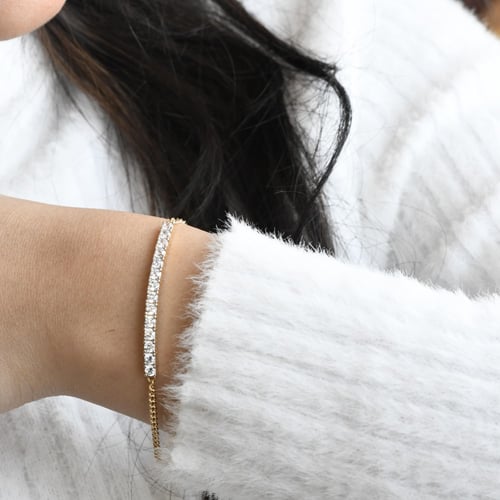 أسورة أنيقة باللون / ذهبي . (B979)