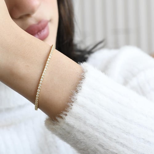 أساور التنس الأنيقة باللون الذهبي (B705) .