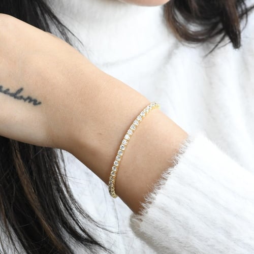 أساور التنس الأنيقة باللون الذهبي (B705) .