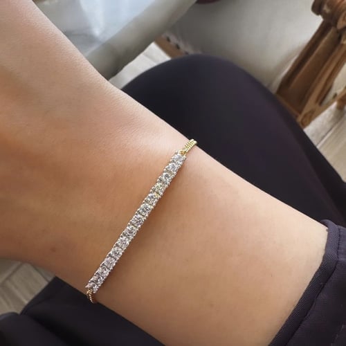 أسورة أنيقة باللون / ذهبي . (B979)