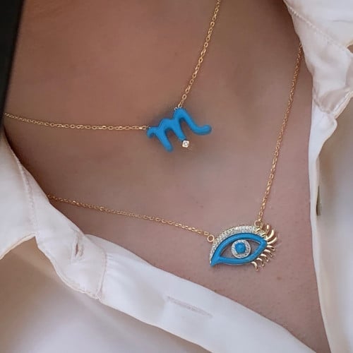 طقم أنيق مكون من قطعتين باللون الذهبي-الفيروزي (SE...