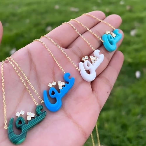 طقم أنيق مكون من قطعتين باللون الذهبي (SET679) .