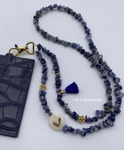 تعليقه بطاقه حجر ازرق