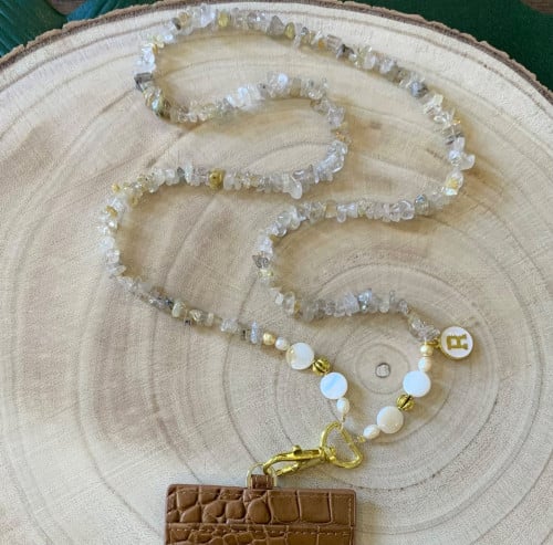 تعليقه بطاقه حجر ذهبي