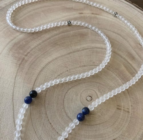 تعليقه بطاقه خرز شفاف