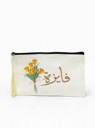 مقلمه ومحفظة مطرزة بالاسم