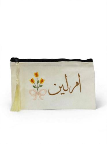 مقلمه ومحفظة مطرزة بالاسم
