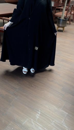 عبايه لف بازره اسود