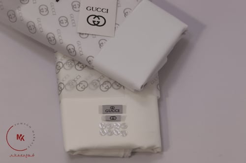 قماش قوتشي ابيض أوكريمي