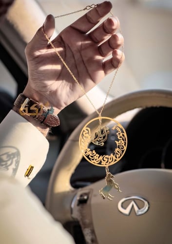 تعليقه سيارة بالاسم