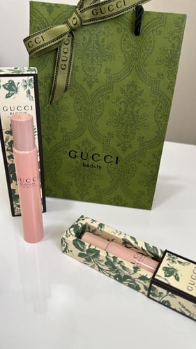 عطر قوتشي ٧ مل مع الكيس