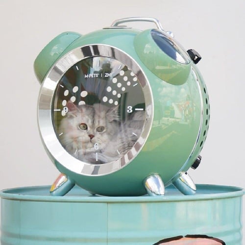 حقيبة نقل للحيوانات الأليفة بتصميم ساعة الستينات