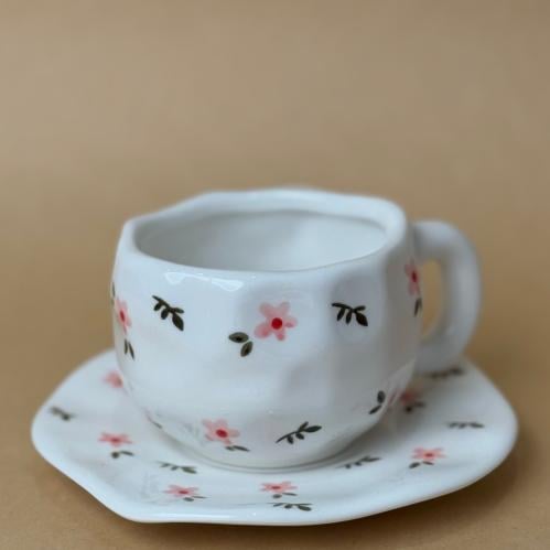 Cup with a plate