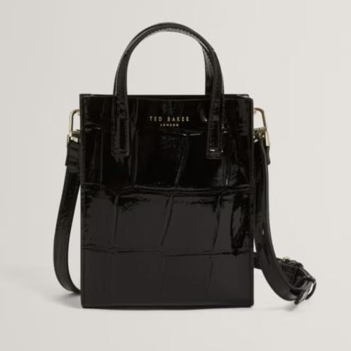 شنطة تيد بيكر توصلك في اسبوع او اقل