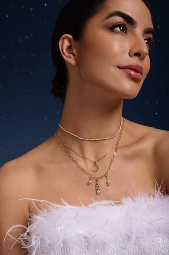 تعليقة شارم ألماس مزينة بالزمرد | شارمدز