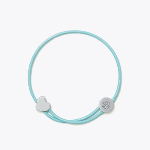 سوارة كيرا سلايدر من توري بورش -مستوحاة من أساور ا...