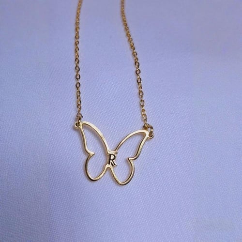 تفصيل سلسال + اسورة على شكل فراشة يتوسطه حررف