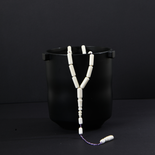 A white ivory bone with a hint of yellow