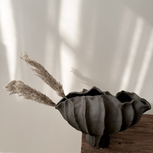 Black blooming flower vase