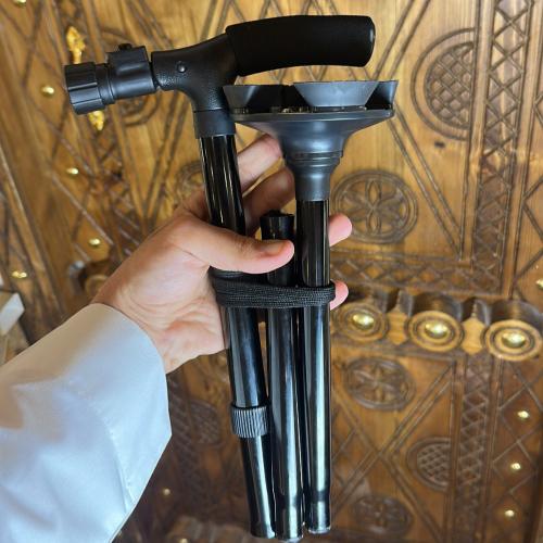 عصا قابل للسفط و كشاف - اسود