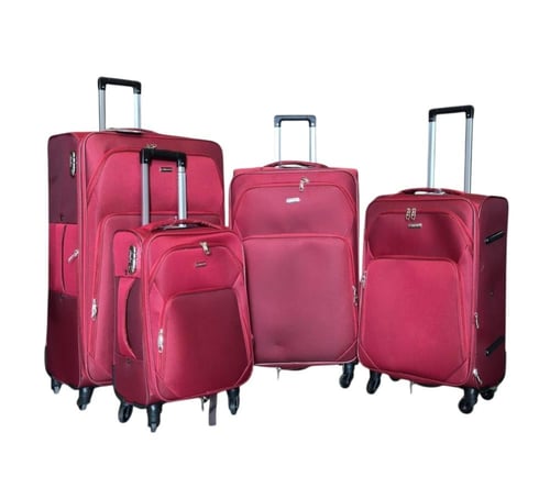 شنط سفر مكونة من اربع قطع مصنوعة من القماش